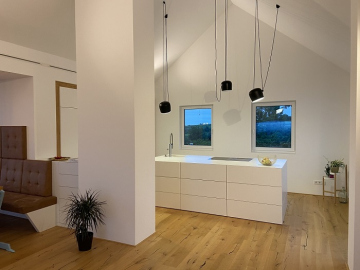 Kochinsel mit Schleiflackoberfläche, Inselarbeitsplatte Dekton, integriertes BORA-System